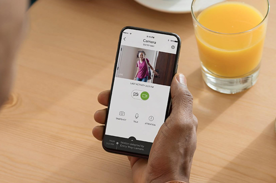 Indoor home security camera feed viewed on a smartphone